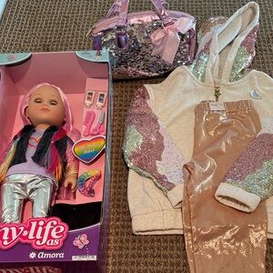 Amora Doll with Pink Hair and Accessories and matching outfit for a lucky girl.